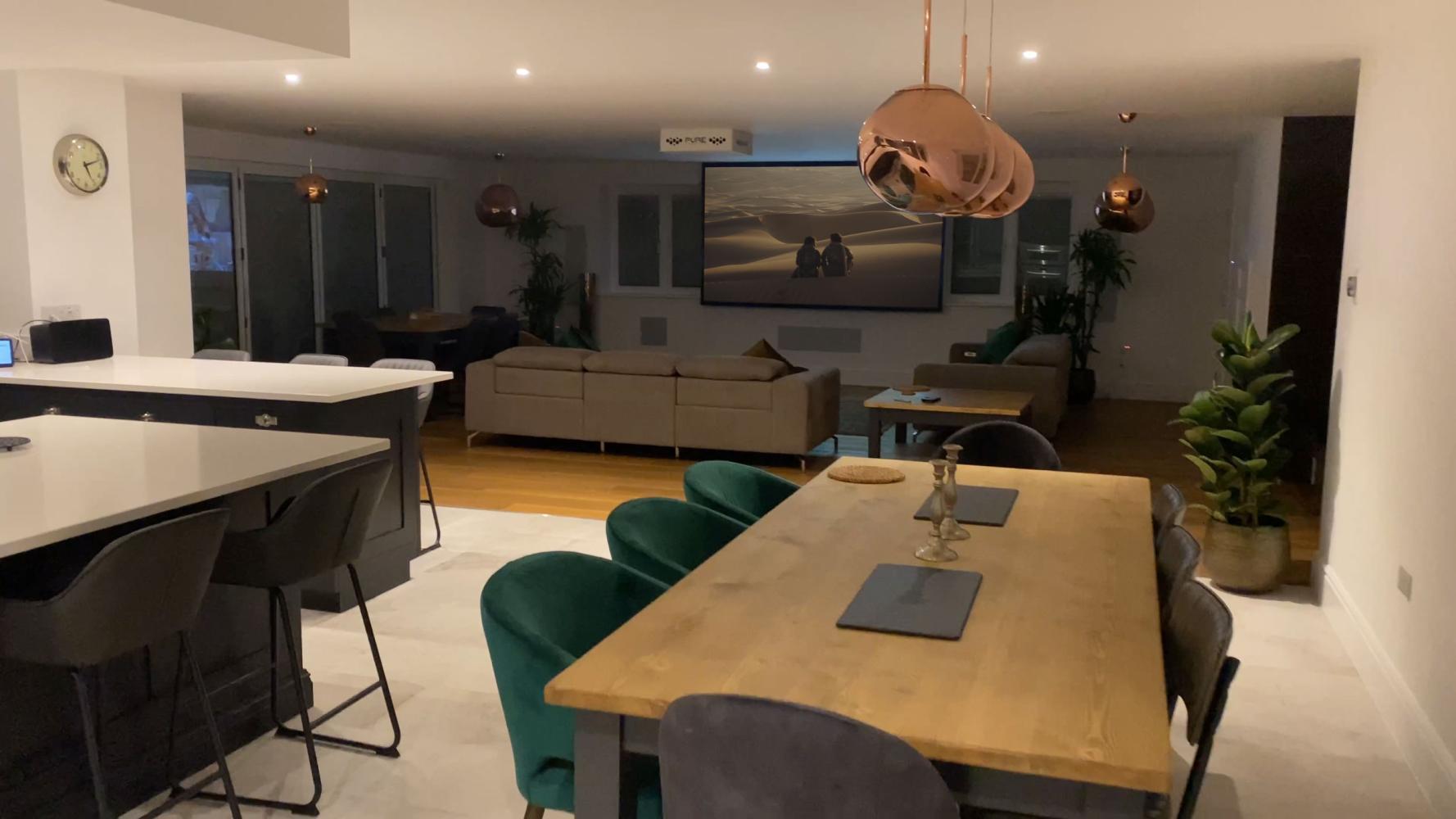 Open plan living space with projector screen