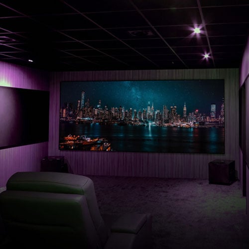 Nightscape image projected onto screen in home cinema