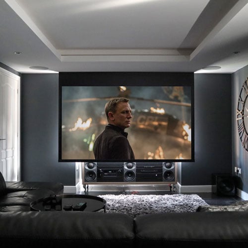 Recessed Projector screen showing James bond in living room