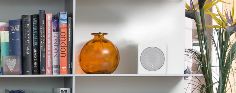 Monitor Audio Radius 45 Bookshelf speaker white on a shelf