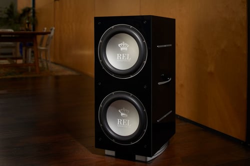 Rel 212SX Black Subwoofer in a living space
