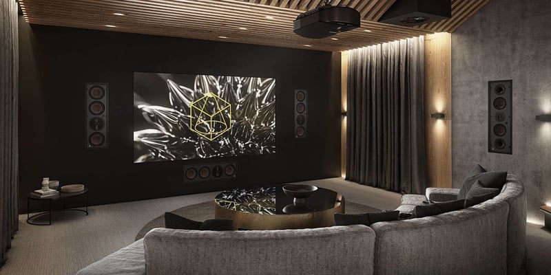 Home cinema room with projector screen and Dali Phantom M-25 speakers